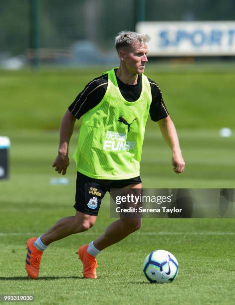 Matt Ritchie controls the ball during the Newcastle United Training Session at the Newcastle United Training Centre on July 7 in Newcastle upon Tyne,...