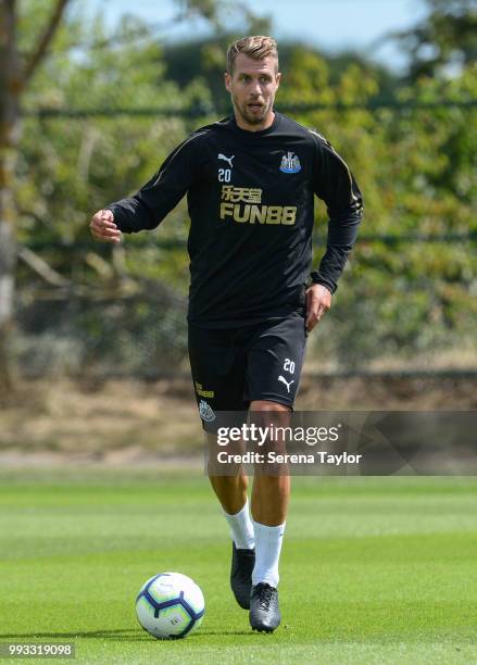 Florian Lejeune runs with the ball during the Newcastle United Training Session at the Newcastle United Training Centre on July 7 in Newcastle upon...