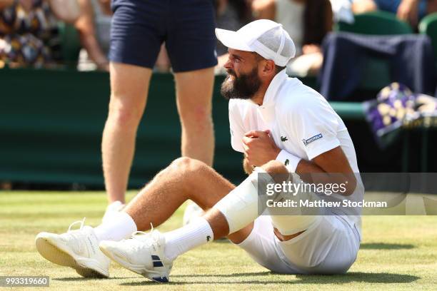 Benoit Paire of France reacts against Juan Martin del Potro of Argentina during their Men's Singles third round match on day six of the Wimbledon...
