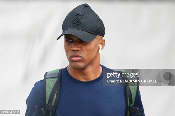 Brazil's forward Douglas Costa leaves his team's hotel in Kazan on July 7 a day after the five-time champions crashed out of the Russia 2018 World...