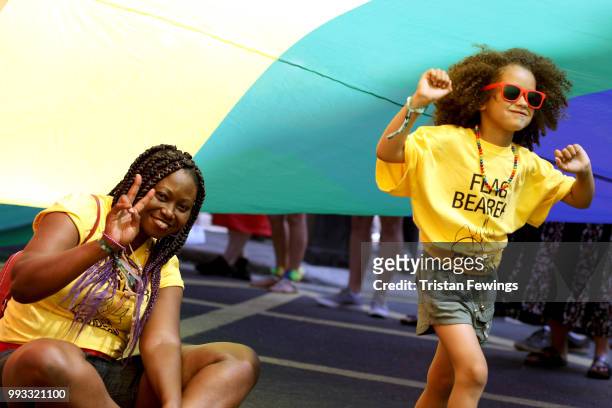 Flag bearers on the parade route during Pride In London on July 7, 2018 in London, England. It is estimated over 1 million people will take to the...
