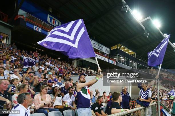 Dockers fans celebrate a goal during the round 16 AFL match between the Melbourne Demons and the Fremantle Dockers at TIO Stadium on July 7, 2018 in...