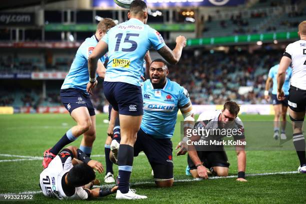 Sekope Kepu of the Waratahs celebrates scoring a try during the round 18 Super Rugby match between the Waratahs and the Sunwolves at Allianz Stadium...
