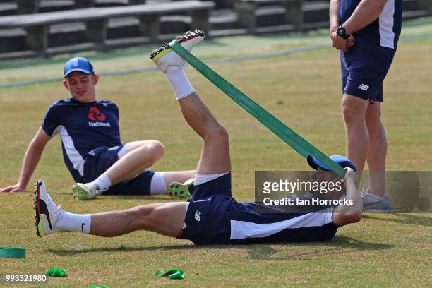 Ollie Robinson stretches during a England Young Lions nets training session at Scarborough Cricket Club on July 7, 2018 in Scarborough, England.