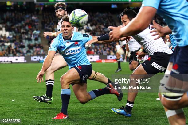 Nick Phipps of the Waratahs passes during the round 18 Super Rugby match between the Waratahs and the Sunwolves at Allianz Stadium on July 7, 2018 in...