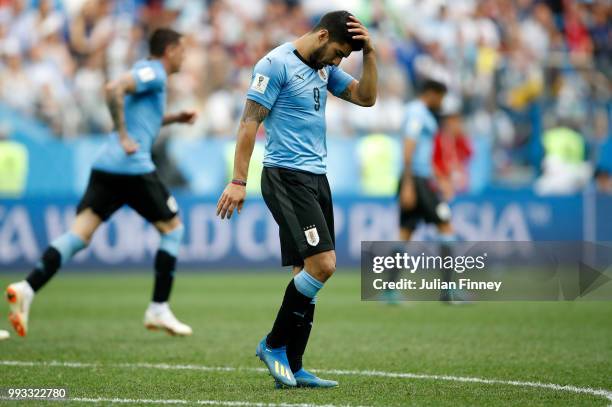 Luis Suarez of Uruguay looks dejected after the 2018 FIFA World Cup Russia Quarter Final match between Winner Game 49 and Winner Game 50 at Nizhny...