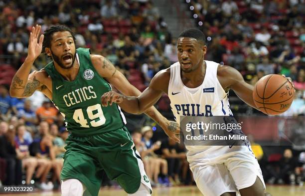 Demetrius Jackson of the Philadelphia 76ers drives against Pierria Henry of the Boston Celtics during the 2018 NBA Summer League at the Thomas & Mack...