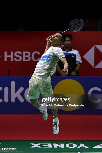 Lee Chong Wei of Malaysia competes against Kento Momota of Japan during the Men's Singles Semi-final match on day five of the Blibli Indonesia Open...