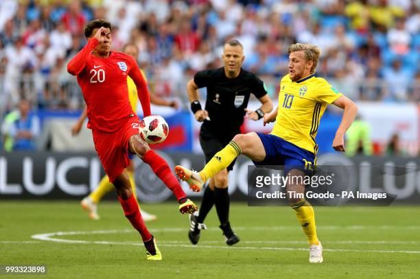 England's Dele Alli and Sweden's Emil Forsberg battle for the ball during the FIFA World Cup, Quarter Final match at the Samara Stadium.