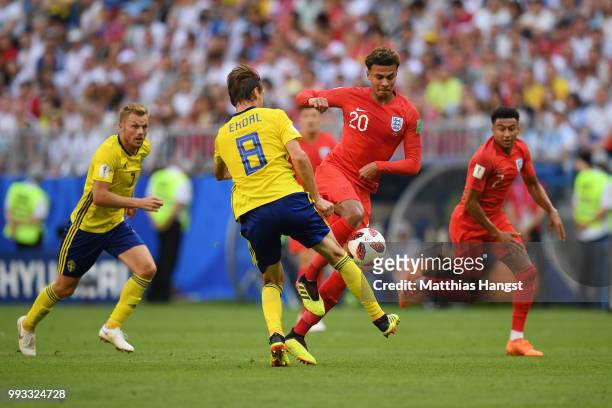 Albin Ekdal of Sweden challenges Dele Alli of England during the 2018 FIFA World Cup Russia Quarter Final match between Sweden and England at Samara...