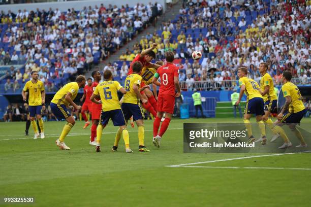 Harry Maguire of England scores the opening goal during the 2018 FIFA World Cup Russia Quarter Final match between Sweden and England at Samara Arena...