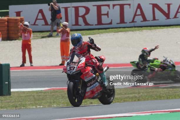 Marco Melandri of Italy and ARUBA.IT RACING-DUCATI greets the fans at the end of the Race 1 during the WorldSBK Riviera di Rimini - Qualifying on...