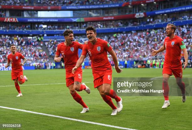Harry Maguire of England celebrates after scoring his team's first goal during the 2018 FIFA World Cup Russia Quarter Final match between Sweden and...