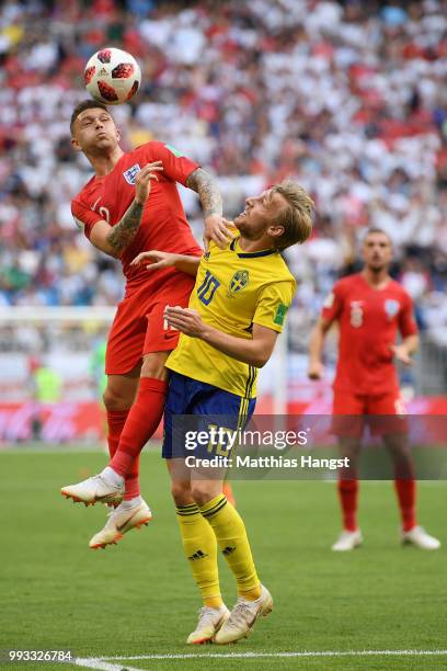 Kieran Trippier of England wins a header from Emil Forsberg of Sweden during the 2018 FIFA World Cup Russia Quarter Final match between Sweden and...