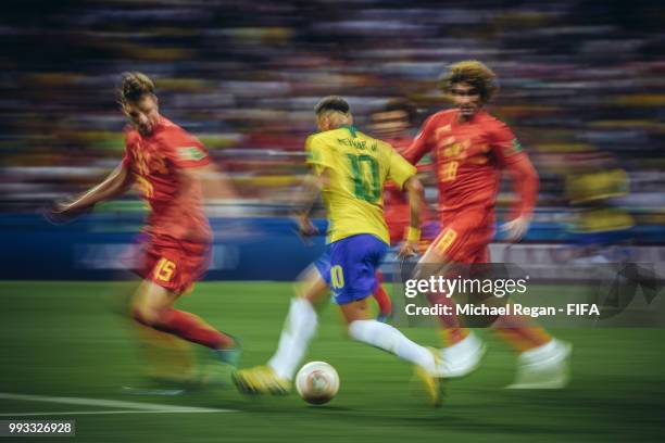 Thomas Meunier and Marouane Fellaini of Belgium block Neymar Jr of Brazil during the 2018 FIFA World Cup Russia Quarter Final match between Winner...