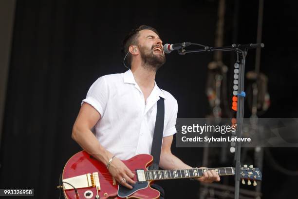 Courteeners' singer Liam Fray performs on stage with his band during Arras' Main Square festival day 2 on July 7, 2018 in Arras, France.