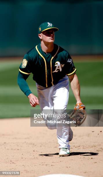 Matt Chapman of the Oakland Athletics fields during the game against the Kansas City Royals at the Oakland Alameda Coliseum on June 10, 2018 in...