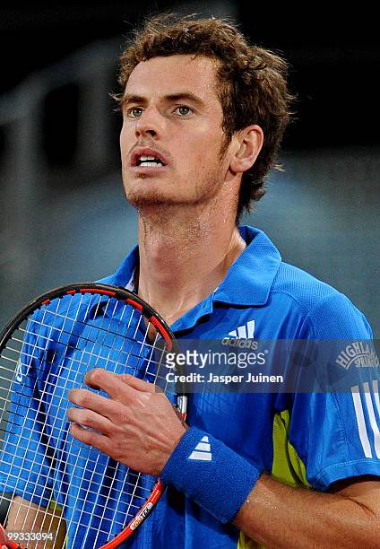 Andy Murray of Great Britain looks on in his quarter final match against David Ferrer of Spain during the Mutua Madrilena Madrid Open tennis...