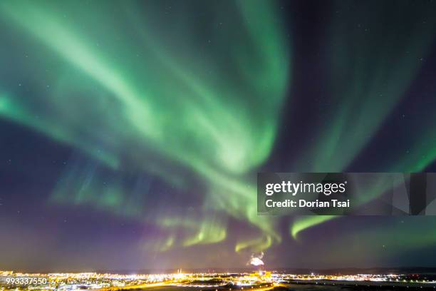 sweeping aurora over kiruna - sweeping landscape stock pictures, royalty-free photos & images