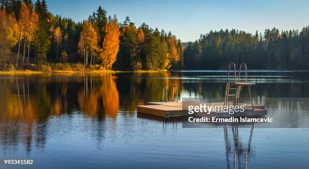 a floating platform in the middle of a lake. - floating platform stock pictures, royalty-free photos & images