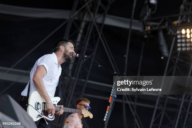 Courteeners' singer Liam Fray performs on stage with his band during Arras' Main Square festival day 2 on July 7, 2018 in Arras, France.