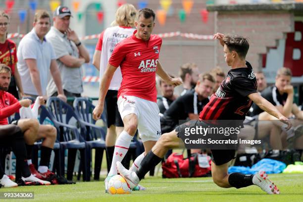 Mats Seuntjens of AZ Alkmaar, Rasmus Nicolaisen of FC Midtjylland during the Club Friendly match between AZ Alkmaar v FC Midtjylland at the VV...