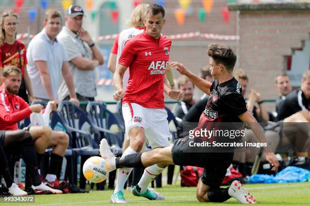 Mats Seuntjens of AZ Alkmaar, Rasmus Nicolaisen of FC Midtjylland during the Club Friendly match between AZ Alkmaar v FC Midtjylland at the VV...
