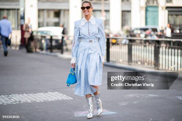 Helena Bordon wearaing blue dress, Fendi velvet bag, silver boots seen outside Fendi Couture on day four during Paris Fashion Week Haute Couture FW18...