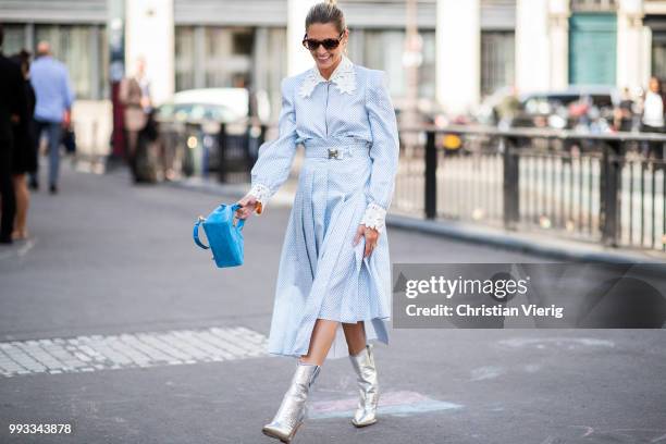 Helena Bordon wearaing blue dress, Fendi velvet bag, silver boots seen outside Fendi Couture on day four during Paris Fashion Week Haute Couture FW18...