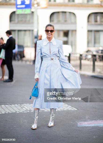 Helena Bordon wearaing blue dress, Fendi velvet bag, silver boots seen outside Fendi Couture on day four during Paris Fashion Week Haute Couture FW18...