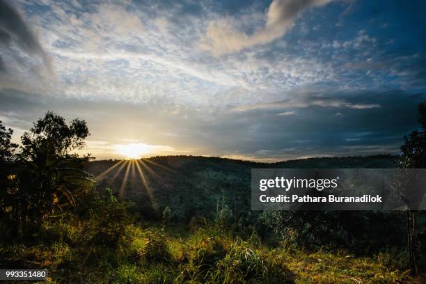 sunset at another side of mor hin khao - mor stock-fotos und bilder