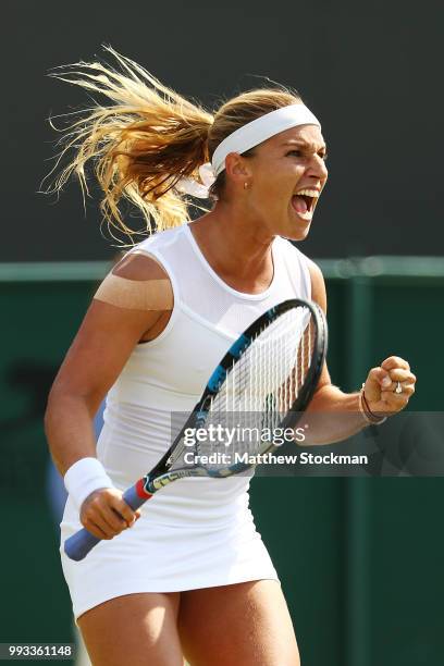 Dominika Cibulkova of Slovakia celebrates after defeating Elise Mertens of Belgium in their Ladies' Singles third round match on day six of the...