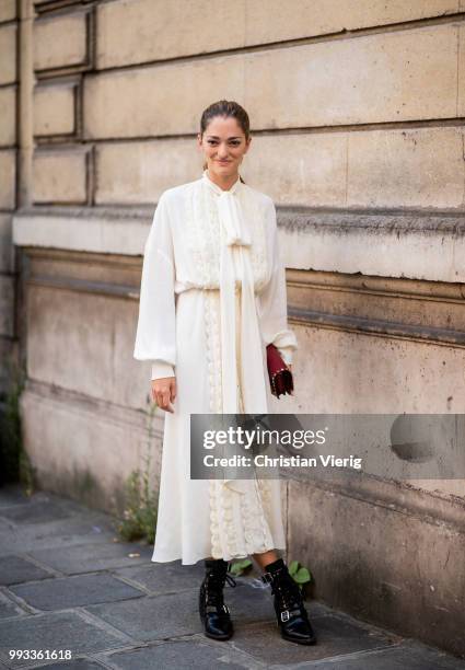 Sofia Sanchez de Betak wearing white dress seen outside Valentino on day four during Paris Fashion Week Haute Couture FW18 on July 4, 2018 in Paris,...