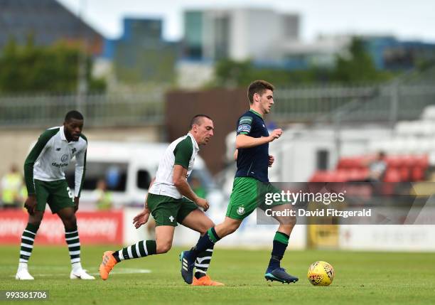 Dublin , Ireland - 7 July 2018; Dylan Watts of Shamrock Rovers in action against Scott Brown of Celtic during the friendly match between Shamrock...