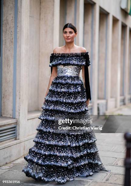 Giovanna Battaglia wearing off shoulder dress seen outside Valentino on day four during Paris Fashion Week Haute Couture FW18 on July 4, 2018 in...