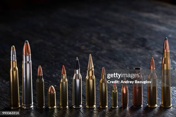 number of large-caliber ammunition with different caliber - vibrator stock pictures, royalty-free photos & images