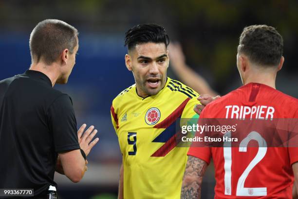 Radamel Falcao of Colombia and Kieran Trippier of England square off during the 2018 FIFA World Cup Russia Round of 16 match between Colombia and...