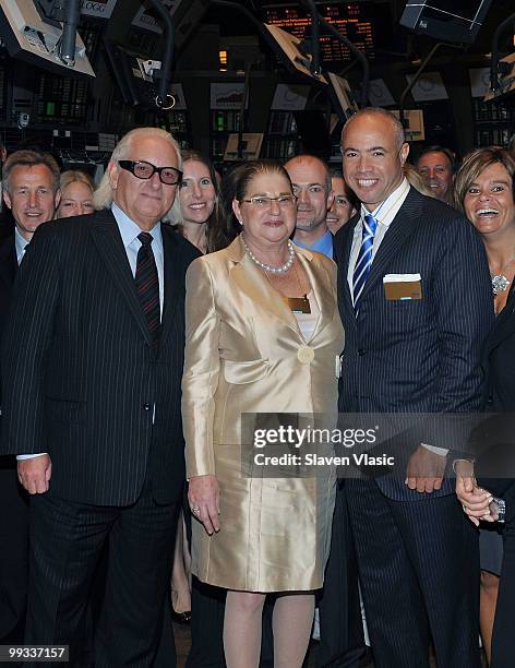 Michael Weiss, President & CEO Express, Inc., Arlene Weiss and Stefan Kaluzny, Chairman of the Board, Express Inc., attend the opening bell at the...