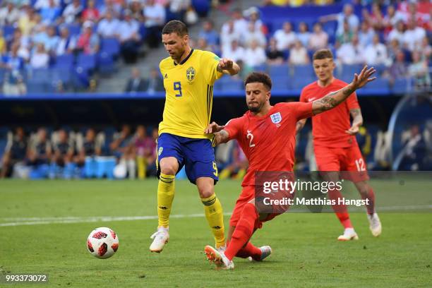 Kyle Walker of England tackles Marcus Berg of Sweden during the 2018 FIFA World Cup Russia Quarter Final match between Sweden and England at Samara...