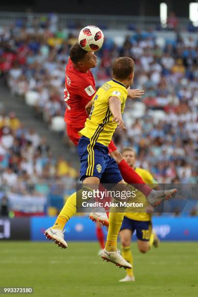 Kieran Trippier of England wins a header over Martin Olsson of Sweden during the 2018 FIFA World Cup Russia Quarter Final match between Sweden and...
