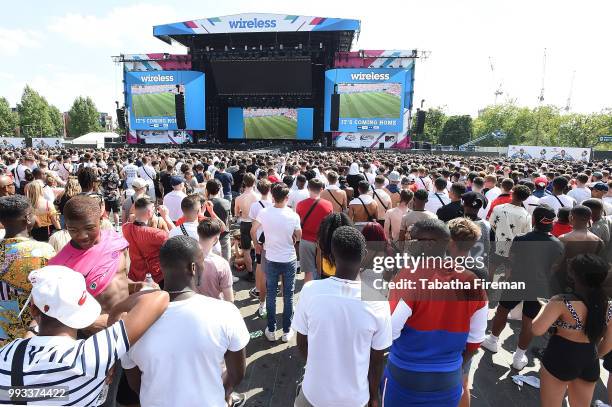 Festival goers enjoy watching the Sweden v England World Cup match on the big screen on the Main Stage during Wireless Festival 2018 at Finsbury Park...