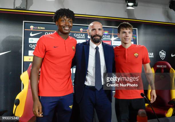 New signing William Bianda, Sport Director Ramon Rodriguez Verdejo Monchi and Ante Coric pose for photographers during the press conference at the AS...