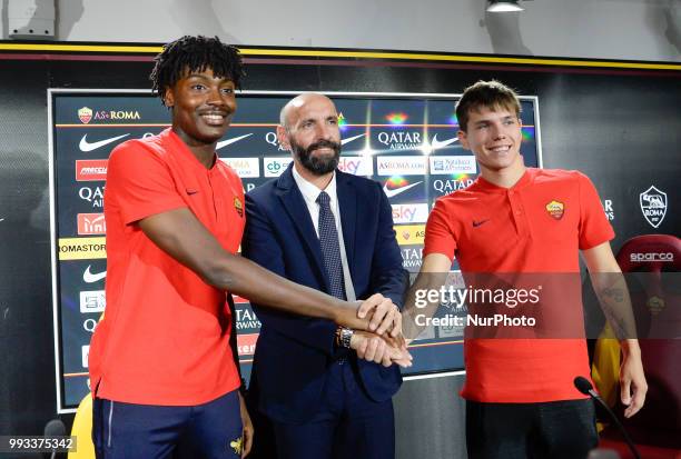 New signing William Bianda, Sport Director Ramon Rodriguez Verdejo Monchi and Ante Coric pose for photographers during the press conference at the AS...