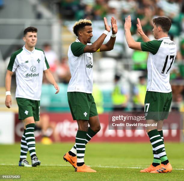 Dublin , Ireland - 7 July 2018; Scott Sinclair of Celtic is congratulated by team mate Ryan Christie during the friendly match between Shamrock...