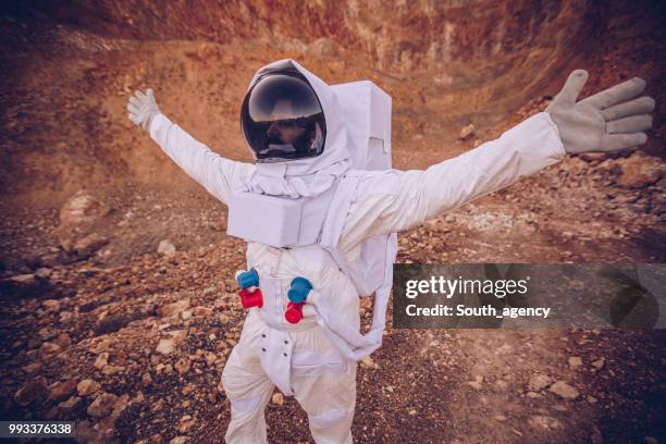 man is happy on mars - cosmonaut stock pictures, royalty-free photos & images