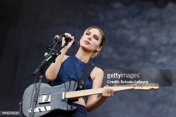 Wolf Alice band singer's Ellie Rowsell performs on stage with her band during Arras' Main Square festival day 2 on July 7, 2018 in Arras, France.