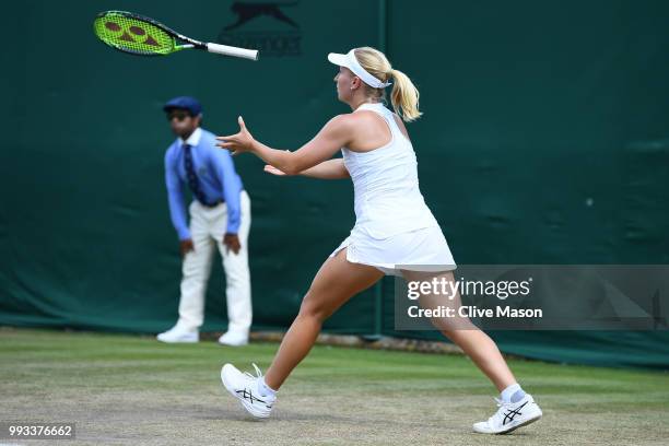 Daria Gavrilova of Australia tosses her racket against Aliaksandra Sasnovich of Belarus during their Ladies' Singles third round match on day six of...