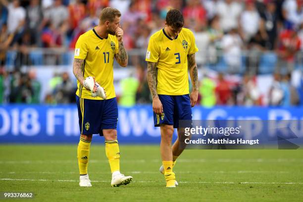 John Guidetti of Sweden and Victor Lindelof of Sweden look dejected following their sides defeat in the 2018 FIFA World Cup Russia Quarter Final...