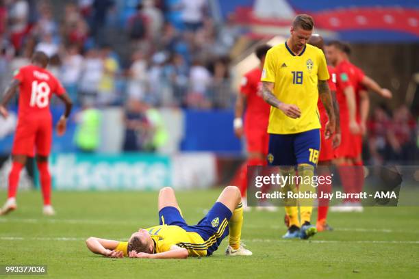 Viktor Claesson of Sweden looks dejected at the end of the 2018 FIFA World Cup Russia Quarter Final match between Sweden and England at Samara Arena...