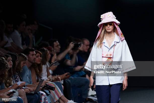 Model presents a creation by Spanish Outsiders Division at the fashion show at the EGO Mercedes-Benz Fashion Week Madrid Spring-Summer 2019, in...